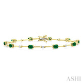 4x3 MM Oval Cut Emerald and 1/3 Ctw Round Cut Diamond Precious Bar Bracelet in 10K Yellow Gold