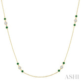 2.25 MM Emerald and 1/2 Ctw Round Cut Diamond Precious Station Necklace in 14K Yellow Gold