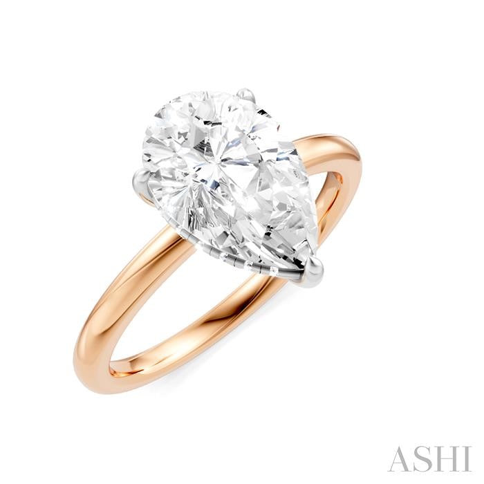 1/10 Ctw Pear Shape Round Cut Diamond Semi-Mount Engagement Ring in 14K Rose and White Gold