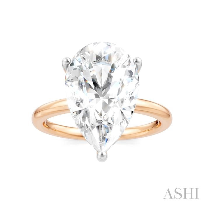 1/8 Ctw Pear Shape Round Cut Diamond Semi-Mount Engagement Ring in 14K Rose and White Gold