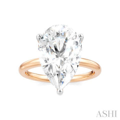 1/8 Ctw Pear Shape Round Cut Diamond Semi-Mount Engagement Ring in 14K Rose and White Gold