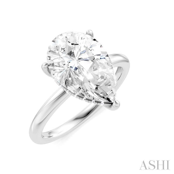 1/10 Ctw Pear Shape Round Cut Diamond Semi-Mount Engagement Ring in 14K White Gold