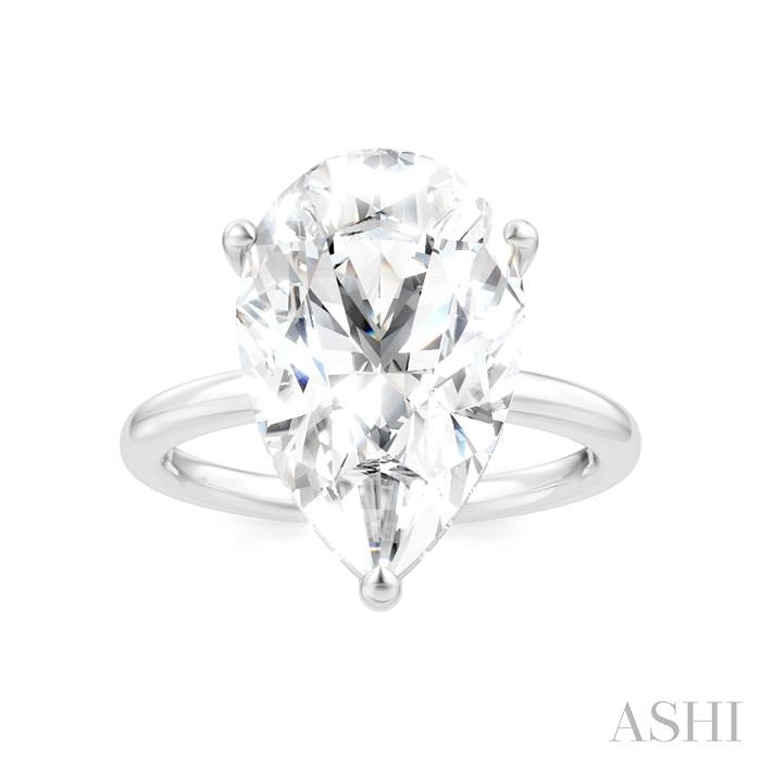 1/8 Ctw Pear Shape Round Cut Diamond Semi-Mount Engagement Ring in 14K White Gold