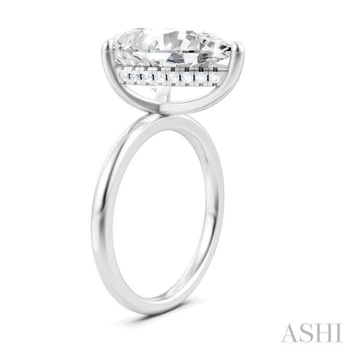 1/8 Ctw Pear Shape Round Cut Diamond Semi-Mount Engagement Ring in 14K White Gold