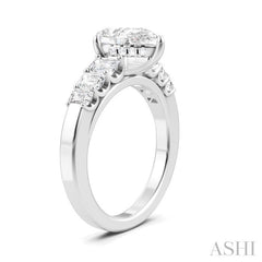1 Ctw Pear Shape Emerald and Round Cut Diamond Semi-Mount Engagement Ring in 14K White Gold