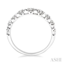 1/20 Ctw Round Cut Diamond Wedding Band in 14K White Gold