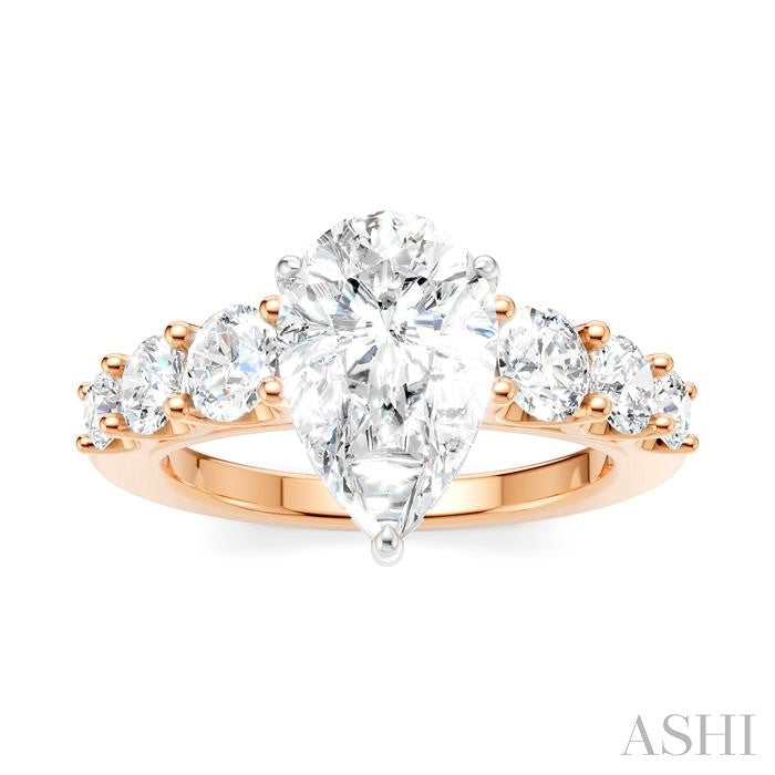 1 1/10 Ctw Pear Shape Round Cut Diamond Semi-Mount Engagement Ring in 14K Rose and White Gold