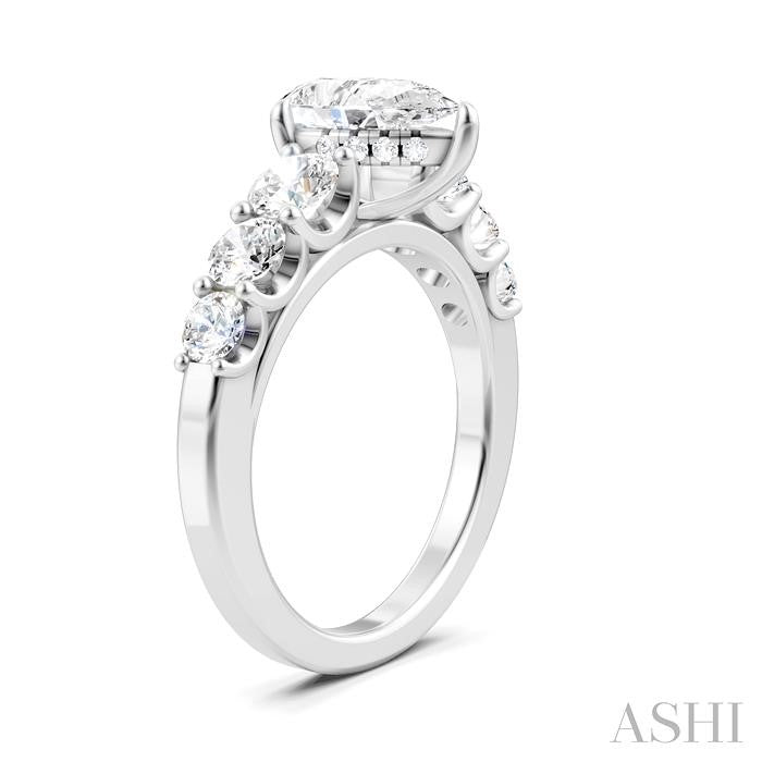 1 1/10 Ctw Pear Shape Round Cut Diamond Semi-Mount Engagement Ring in 14K White Gold