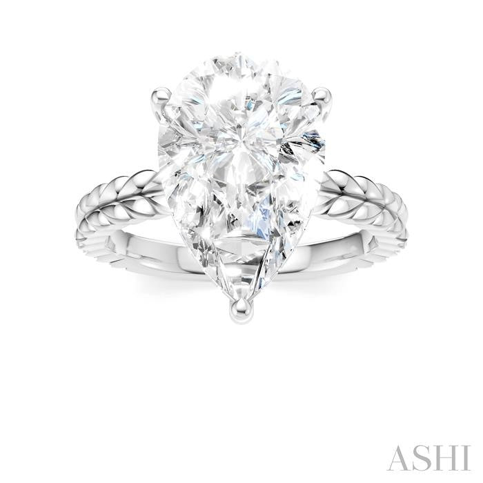 1/8 Ctw Pear Shape Round Cut Diamond Semi-Mount Engagement Ring in 14K White Gold