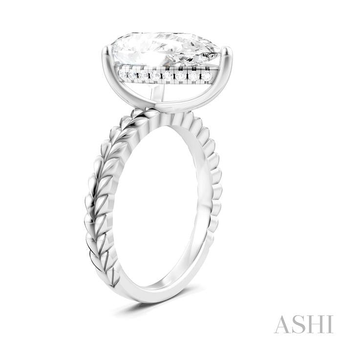 1/8 Ctw Pear Shape Round Cut Diamond Semi-Mount Engagement Ring in 14K White Gold