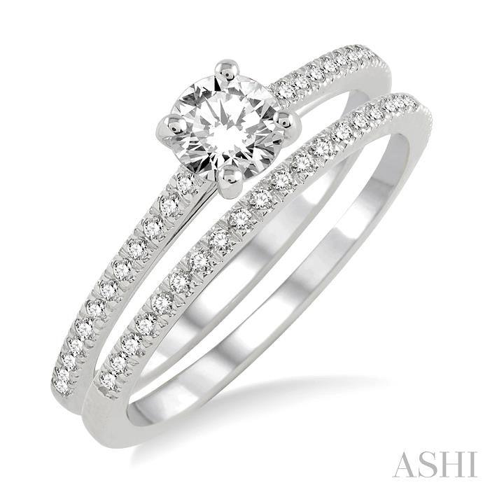 5/8 Ctw Diamond Wedding Set with 1/2 Ctw Round Cut Engagement Ring and 1/10 Ctw Wedding Band in 14K White Gold