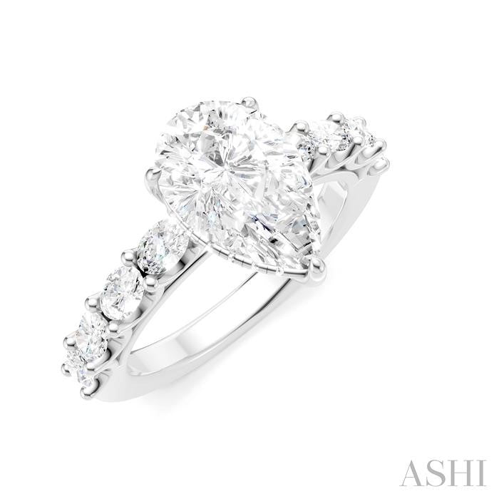 7/8 Ctw Pear Shape Oval and Round Cut Diamond Semi-Mount Engagement Ring in 14K White Gold