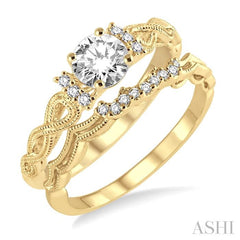 3/8 Ctw Diamond Wedding Set with 1/3 Ctw Round Cut Engagement Ring and 1/20 Ctw Wedding Band in 14K Yellow Gold