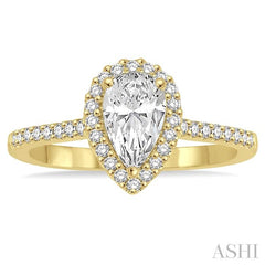 5/8 Ctw Diamond Engagement Ring with 1/3 Ct Pear Shaped Center stone in 14K Yellow Gold