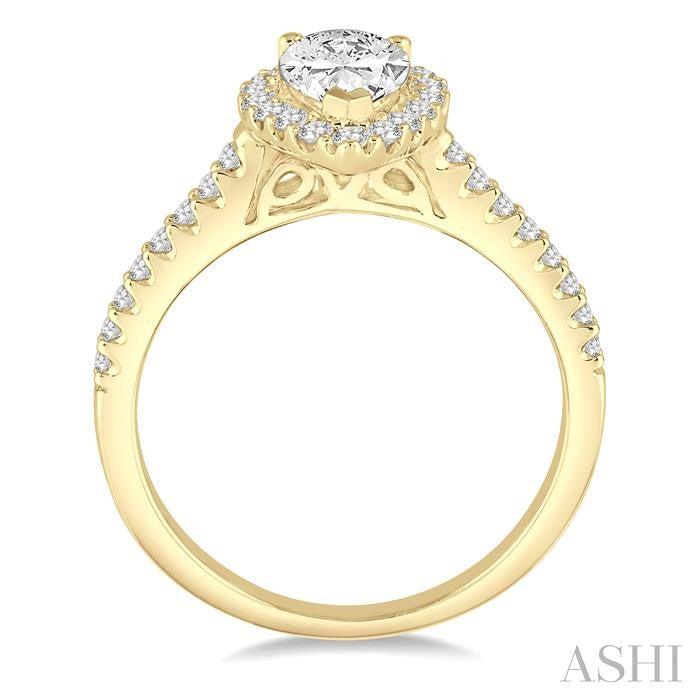 5/8 Ctw Diamond Engagement Ring with 1/3 Ct Pear Shaped Center stone in 14K Yellow Gold