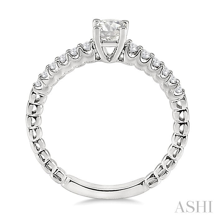 1/4 Ctw Round Cut Diamond Semi-Mount Engagement Ring in 14K White Gold