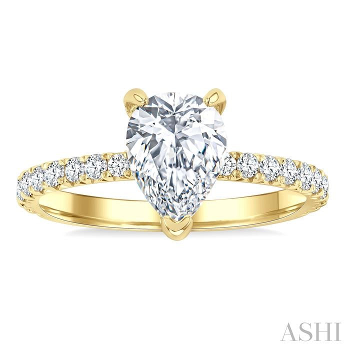 5/8 Ctw Round Cut Diamond Pear Shape Semi-Mount Engagement Ring in 14K Yellow Gold