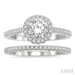7/8 Ctw Round Cut Diamond Wedding Set With 3/4 Ctw Round Cut Engagement Ring and 1/6 Ctw Wedding Band in 14K White Gold