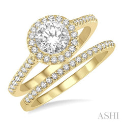 7/8 Ctw Round Cut Diamond Wedding Set With 3/4 Ctw Round Cut Engagement Ring and 1/6 Ctw Wedding Band in 14K Yellow and white gold