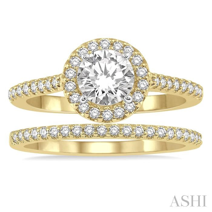 7/8 Ctw Round Cut Diamond Wedding Set With 3/4 Ctw Round Cut Engagement Ring and 1/6 Ctw Wedding Band in 14K Yellow and white gold