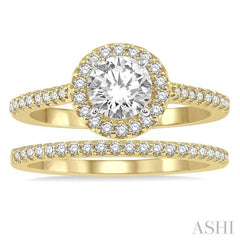 7/8 Ctw Round Cut Diamond Wedding Set With 3/4 Ctw Round Cut Engagement Ring and 1/6 Ctw Wedding Band in 14K Yellow and white gold