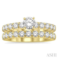 1 1/2 Ctw Diamond Wedding Set With 1 Ctw Round Cut Engagement Ring and 1/2 Ctw Wedding Band in 14K Yellow Gold