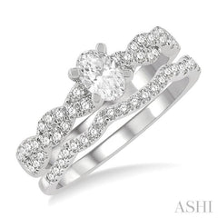 1 1/10 Ctw Diamond Wedding Set With 7/8 Ctw Twisted Shank Oval Cut Engagement Ring and 1/6 Ctw Curve Wedding Band in 14K White Gold