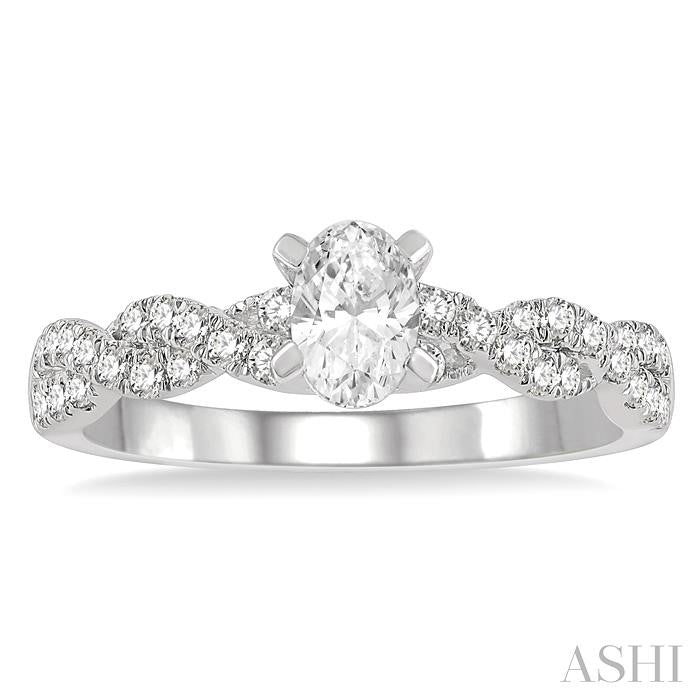 7/8 Ctw Twisted Shank Round Cut Diamond Engagement Ring With 1/2 Ct Oval Cut Center Stone in 14K White Gold