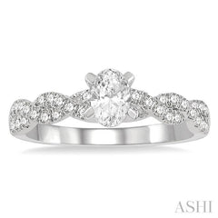 7/8 Ctw Twisted Shank Round Cut Diamond Engagement Ring With 1/2 Ct Oval Cut Center Stone in 14K White Gold