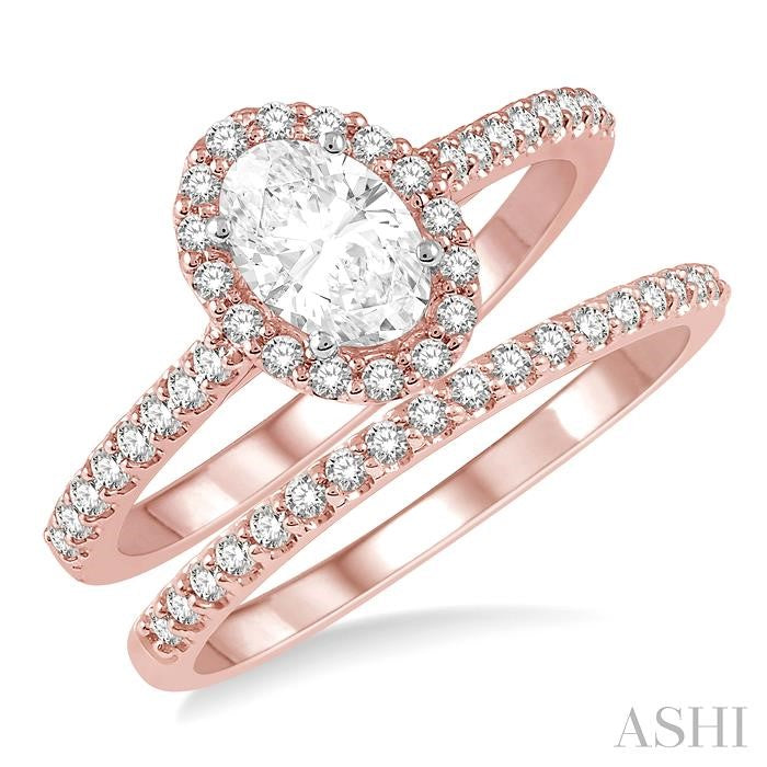 7/8 Ctw Diamond Wedding Set With 3/4 Ctw Oval Cut Engagement Ring and 1/6 Ctw Wedding Band in 14K Rose and White Gold