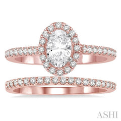 7/8 Ctw Diamond Wedding Set With 3/4 Ctw Oval Cut Engagement Ring and 1/6 Ctw Wedding Band in 14K Rose and White Gold