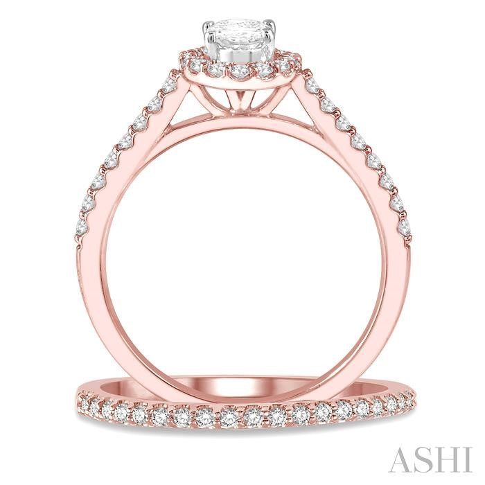 7/8 Ctw Diamond Wedding Set With 3/4 Ctw Oval Cut Engagement Ring and 1/6 Ctw Wedding Band in 14K Rose and White Gold
