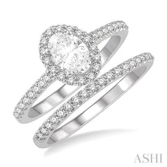 7/8 Ctw Diamond Wedding Set With 3/4 Ctw Oval Cut Engagement Ring and 1/6 Ctw Wedding Band in 14K White Gold
