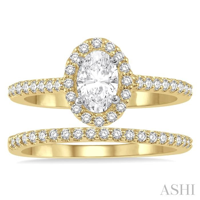 7/8 Ctw Diamond Wedding Set With 3/4 Ctw Oval Cut Engagement Ring and 1/6 Ctw Wedding Band in 14K Yellow and white gold