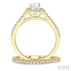 7/8 Ctw Diamond Wedding Set With 3/4 Ctw Oval Cut Engagement Ring and 1/6 Ctw Wedding Band in 14K Yellow and white gold