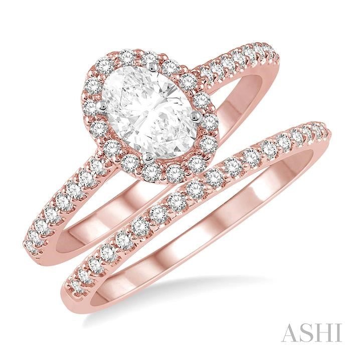 1/2 Ctw Diamond Wedding Set With 3/8 Ct Oval Cut Engagement Ring and 1/10 Ct Wedding Band in 14K Rose and White Gold