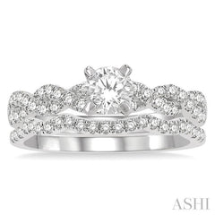 1 1/10 Ctw Diamond Wedding Set With 7/8 Ctw Twisted Shank Round Cut Engagement Ring and 1/6 Ctw Curve Wedding Band in 14K White Gold