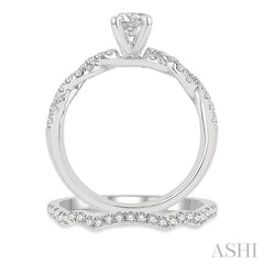 1 1/10 Ctw Diamond Wedding Set With 7/8 Ctw Twisted Shank Round Cut Engagement Ring and 1/6 Ctw Curve Wedding Band in 14K White Gold