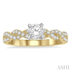 7/8 Ctw Twisted Shank Round Cut Diamond Engagement Ring With 1/2 Ct Center Stone in 14K Yellow and White Gold