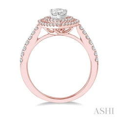 1/2 Ctw Pear Shape Engagement Ring with 1/4 Ct Pear Cut Center Stone in 14K Rose and White Gold