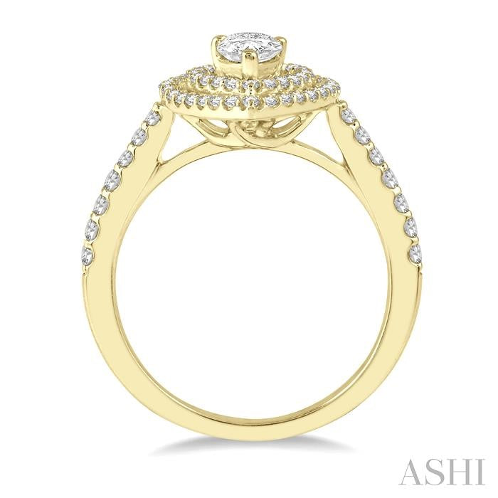 1/4 Ctw Pear Shape Semi-Mount Round Cut Diamond Engagement Ring in 14K Yellow Gold