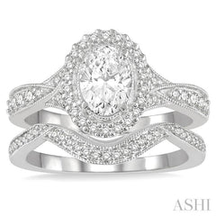 1 1/10 Ctw Free Form Shank Round Cut Diamond Bridal Set With 1 Ct Oval Cut Engagement Ring and 1/10 Ct Curved Center Wedding Band in 14K White Gold