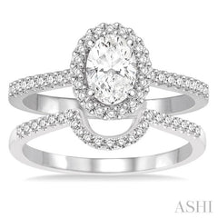 7/8 Ctw Diamond Wedding Set With 3/4 Ctw Oval Shape Engagement Ring and 1/6 Ctw Wedding Band in 14K White Gold