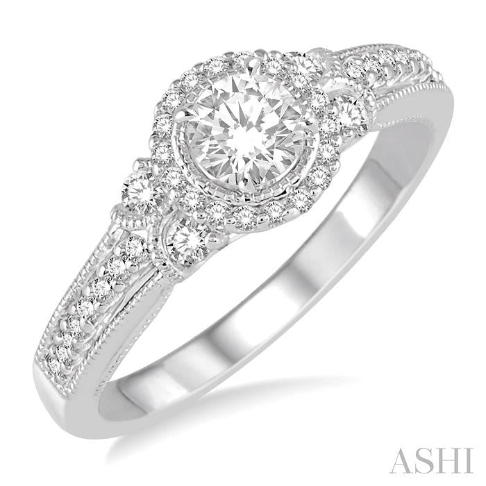 1/2 Ctw Diamond Engagement Ring with 1/5 Ct Round Cut Center Stone in 14K White Gold