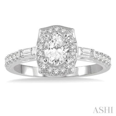 3/4 Ctw Oval, Baguette and Round Cut Diamond Ladies Engagement Ring with 3/8 Ct Oval Cut Center Stone in 14K White Gold