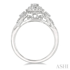 5/8 Ctw Split Twisted Shank Round Cut Diamond Engagement Ring With 1/4 Ct Oval Cut Center Stone in 14K White Gold