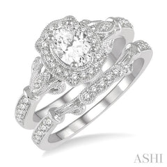 3/4 Ctw Round Cut Diamond Wedding Set With 5/8 Ctw Oval Cut Engagement Ring and 1/10 Ctw Wedding Band in 14K White Gold