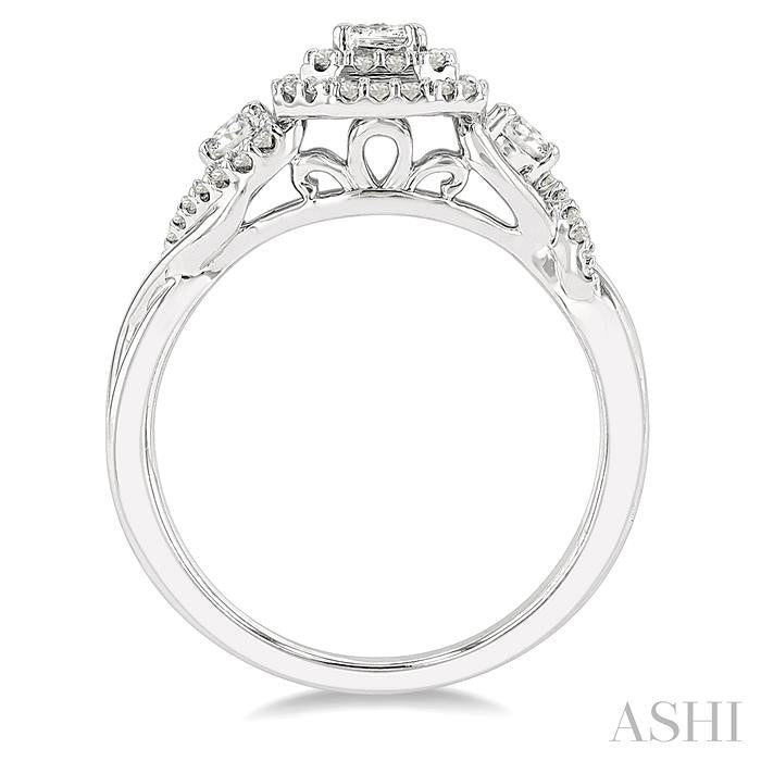 5/8 Ctw Emerald Shape Split Twisted Shank Round Cut Diamond Engagement Ring With 1/4 Ct Emerald Cut Center Stone in 14K White Gold