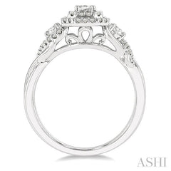 5/8 Ctw Emerald Shape Split Twisted Shank Round Cut Diamond Engagement Ring With 1/4 Ct Emerald Cut Center Stone in 14K White Gold