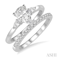 7/8 Ctw Diamond Wedding Set With 3/4 Ctw Pear Cut Engagement Ring and 1/6 Ctw Round Cut Diamond Wedding Band in 14K White Gold
